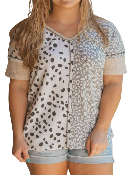 Stylish Plus Size Leopard Print Tee with V-neck design, perfect for any occasion. Comfort meets chic in inclusive sizes.