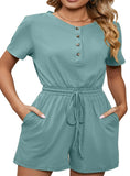 Stylish & comfy drawstring romper with button detail and pockets, perfect for any casual chic occasion
