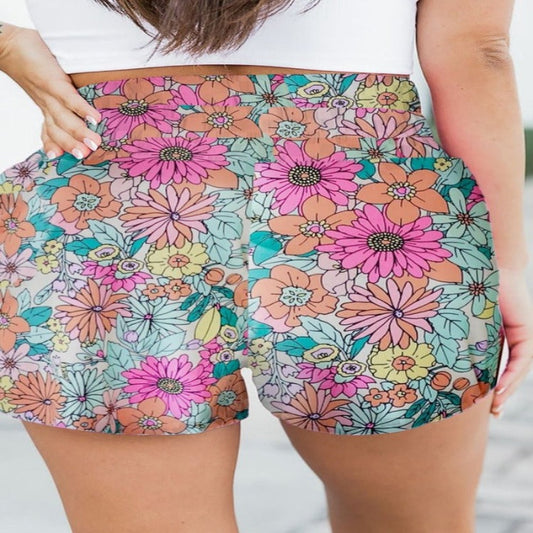 Embrace summer with our Floral Elastic Waist Shorts—perfect for style & comfort. Vibrant prints & breezy fabric for your sunny adventures!