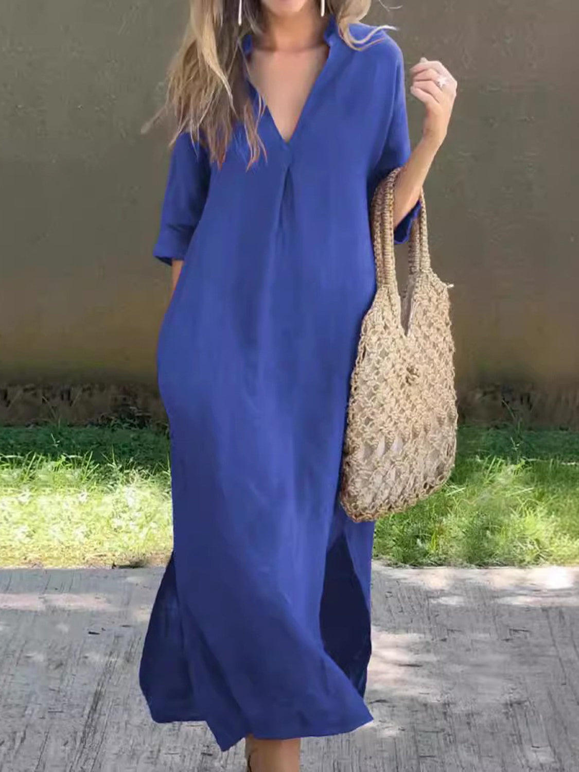 Blue maxi dress with a chic V-neck and comfortable fit.