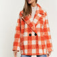 Chic boucle plaid coat for women, featuring side pockets and a lapel neck.
