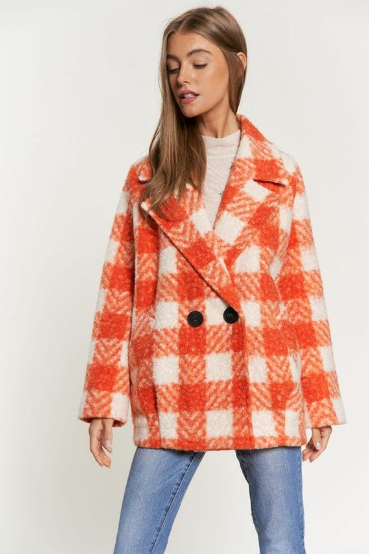 Chic boucle plaid coat for women, featuring side pockets and a lapel neck.
