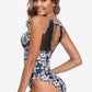 Chic floral one-piece swimsuit with an elegant open back design, perfect for a stylish summer by the pool or on the beach