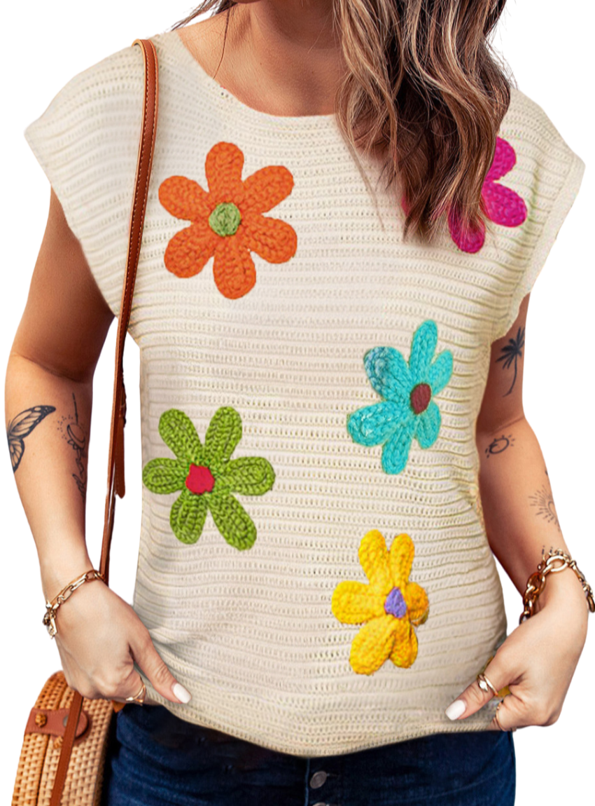 Embrace spring with our Flower Knit Top—perfect for adding a touch of floral charm and comfort to your everyday style