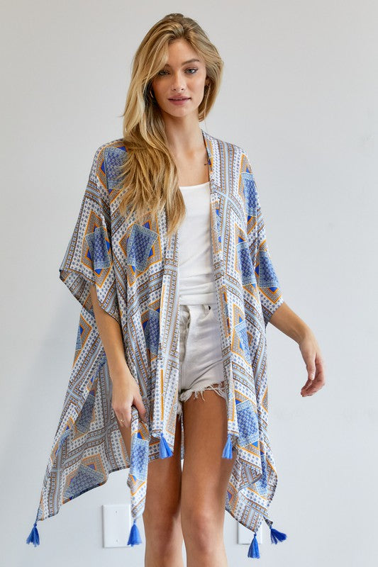 Geometric pattern kimono with tassels, available in blue and yellow