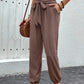 Stylish brown drawstring pants for casual wear.