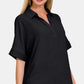 Simple and chic black blouse with a collar and easy-care features