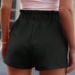 Chic high waist tie shorts with pockets for a stylish, comfortable fit. Perfect for any summer outing.