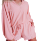 "Chic pink polka-dot loungewear set, featuring a comfy V-neck top and matching shorts with a drawstring waist for a relaxed fit