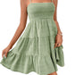 Chic sleeveless smocked green dress with tiered skirt, perfect for summer. Available in 8 colors. Get yours today!