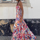 Floral-colored bohemian maxi dress with versatile styling and adjustable straps