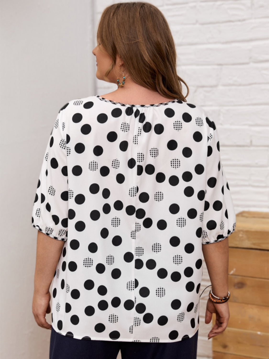 Women's polka dot half sleeve blouse in black and white