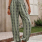 Comfortable green pants with elastic waistband and bohemian design