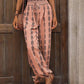 Comfortable pink pants with elastic waistband and bohemian design