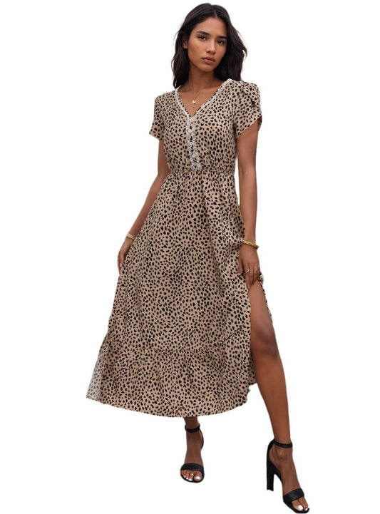 Chic V-Neck Dress with a playful print, elegant slit, and comfy fit for versatile summer styling. Perfect from day to night.