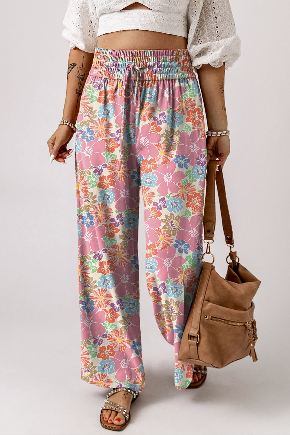 Step into spring with our floral Wide Leg Pants, perfect for versatile styling and unparalleled comfort.