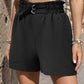 Step out in style with our Pocketed Double Buckle High Waist Shorts. Fashion-forward design meets ultimate comfort. Perfect for any occasion.