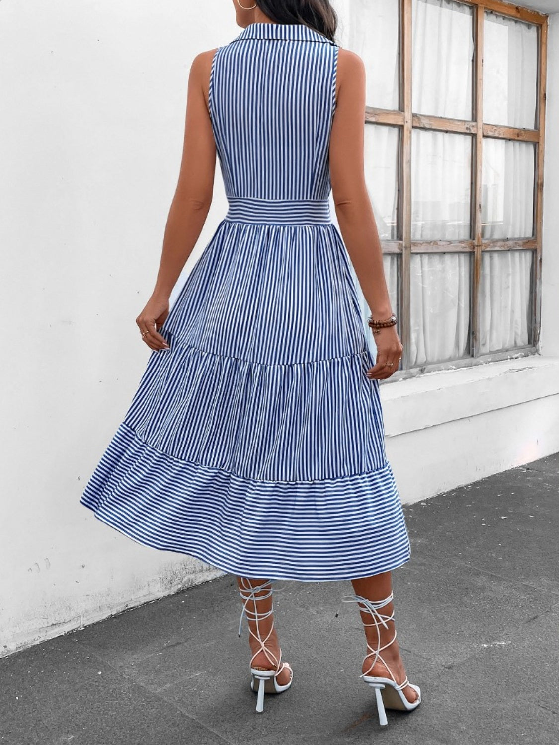 Chic striped midi dress with Johnny collar and waist cinching. Versatile, with pockets and available in 7 colors. Perfect for any occasion.