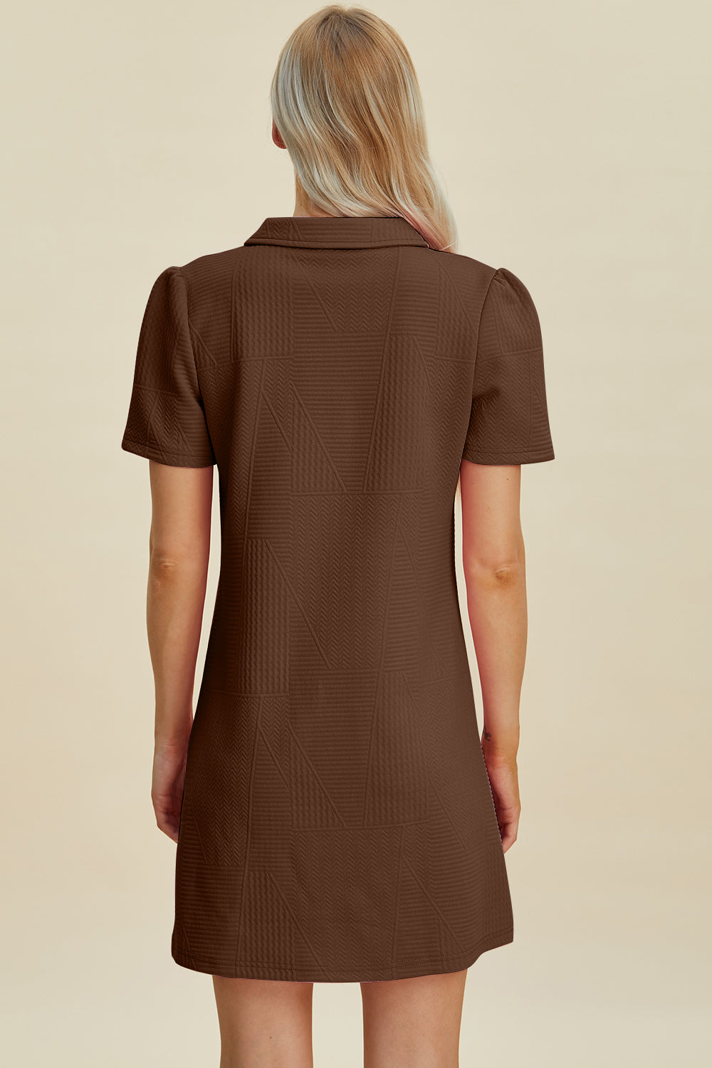 Brown dress with a unique textured fabric and elegant look