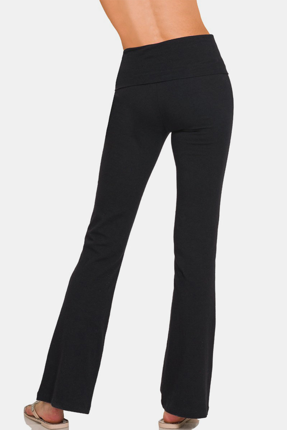 Slim-fit black yoga pants with a flared leg