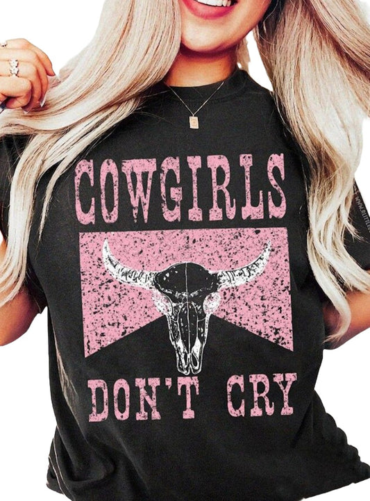 Black "Cowgirls Don't Cry" graphic tee with distressed pink lettering and bull skull design