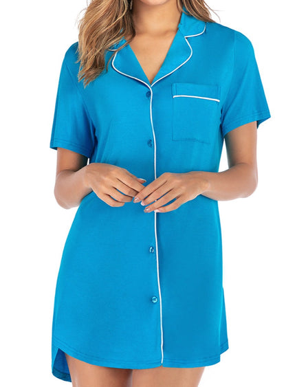 Chic short sleeve lounge dress with contrast piping and pockets, in sky blue, black, and navy. Perfect blend of comfort and style for any occasion