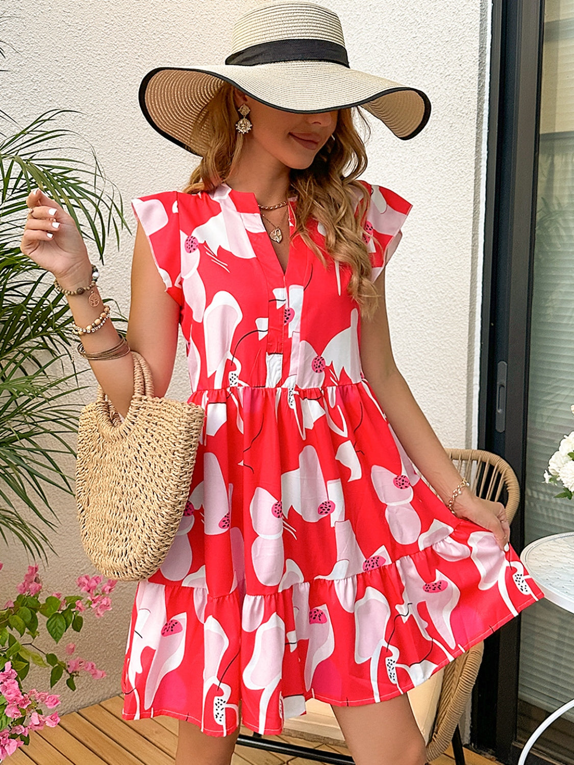 Chic red & white printed dress with a flattering notched neckline, perfect for summer days & casual outings. Shop now for breezy elegance!