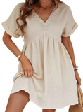 V-Neck Short Sleeve Dress in cream and black. Perfect blend of elegance, comfort, and versatility for any occasion.