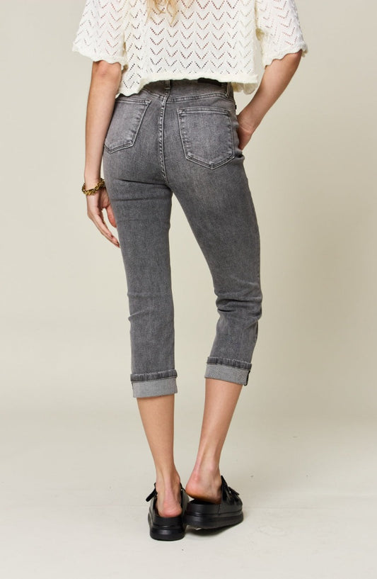 Elevate your wardrobe with Judy Blue's High Waist Cuffed Capris featuring a chic button fly and stretch comfort for all-day wear.