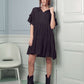 Casual black boho dress with a tiered design and ruffled sleeves.