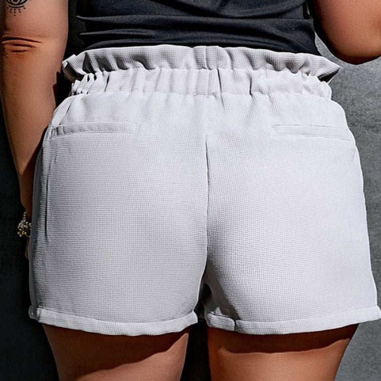 Discover elegance & comfort with our Paperbag Shorts, featuring a flattering high waist, versatile style, and practical pockets for summer.