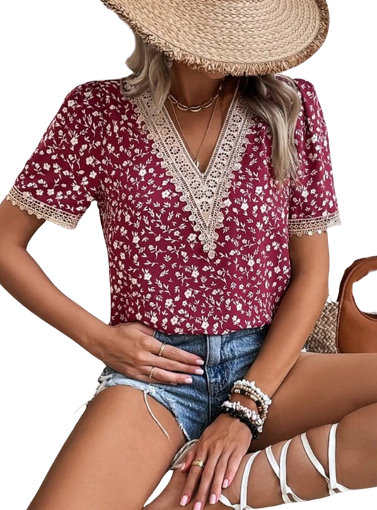 Elevate your style effortlessly with our Full Size Printed V-Neck Short Sleeve Blouse. Comfortable, elegant, and available in 4 stunning colors.