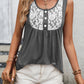 Women's gray top with lace trim and button details.