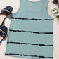 Stylish green top with unique black stripes