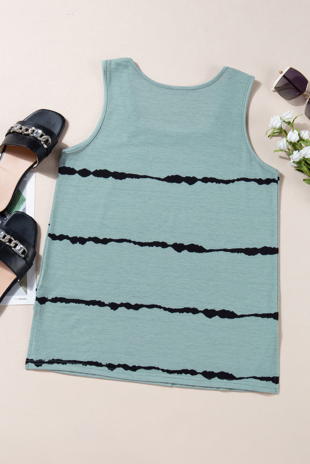 Stylish green top with unique black stripes