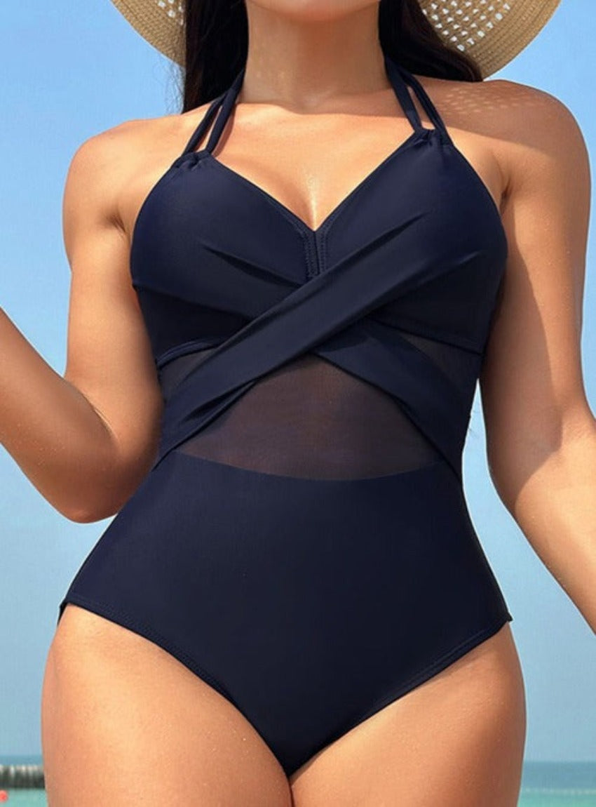 Elevate your poolside look with our elegant Crisscross Halter One-Piece Swimwear, offering a blend of style, comfort, and versatility.