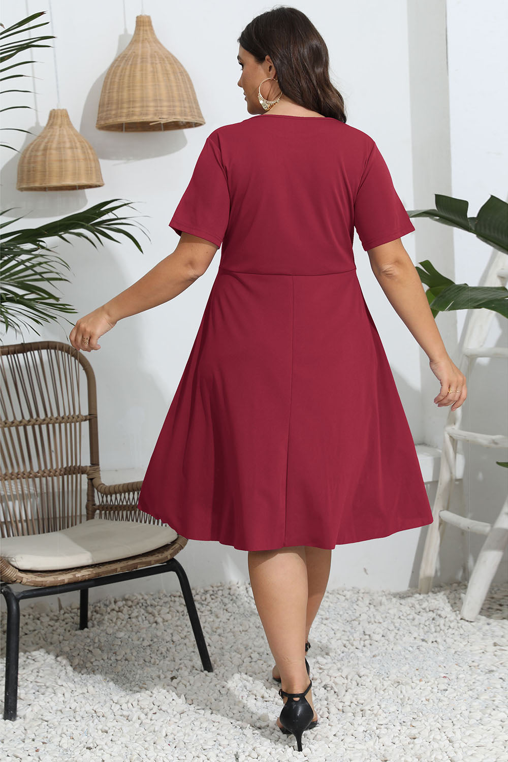 Discover elegance with our Plus Size Dress in red, black, mustard, and blue with a flattering fit and exquisite openwork detailing