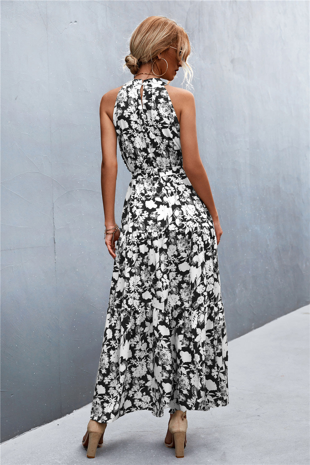 Shop the Printed Sleeveless Tie Waist Maxi Dress in 11 colors - perfect for summer days & elegant evenings. Flattering fit for every occasion.