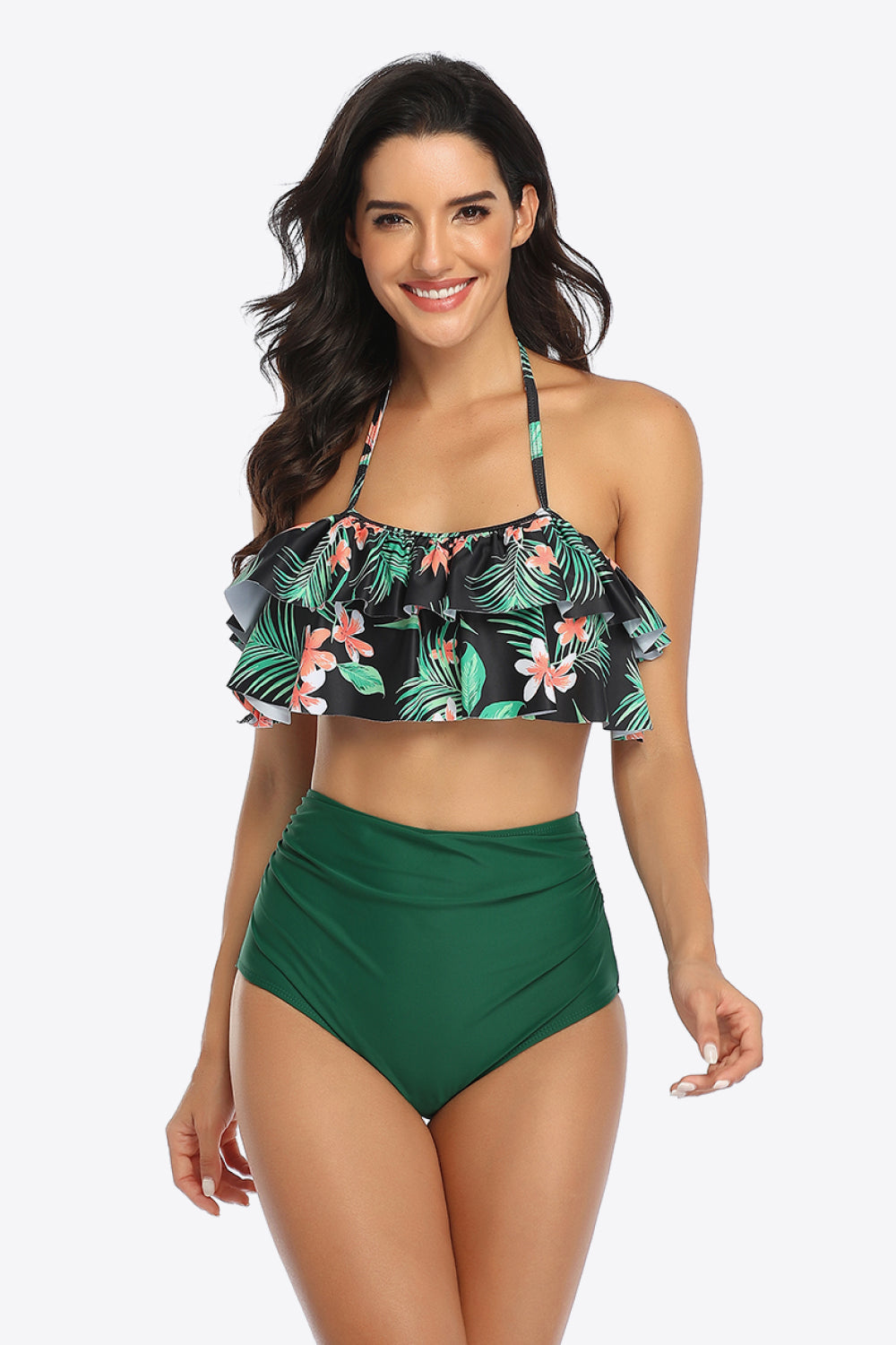 Elevate beach style with our Ruffled Halter Two-Piece Swimsuit. Perfect fit, fun ruffles, tropical vibe. Ideal for sun-soaked days!
