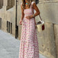 Elegant pink maxi dress featuring lightweight fabric and whimsical boho design