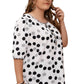 Half sleeve blouse featuring black and white polka dots