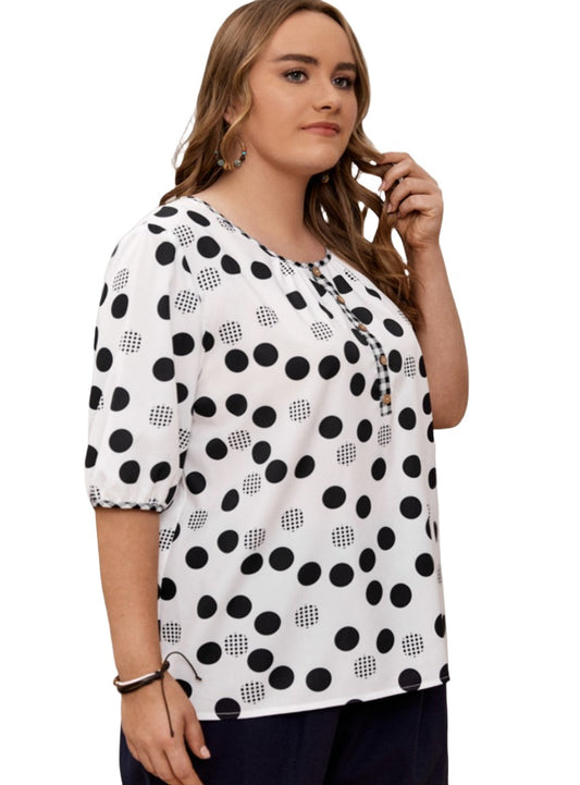 Half sleeve blouse featuring black and white polka dots