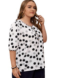 Half sleeve blouse featuring black and white polka dots