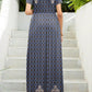 Navy floral maxi dress with intricate border and side pockets