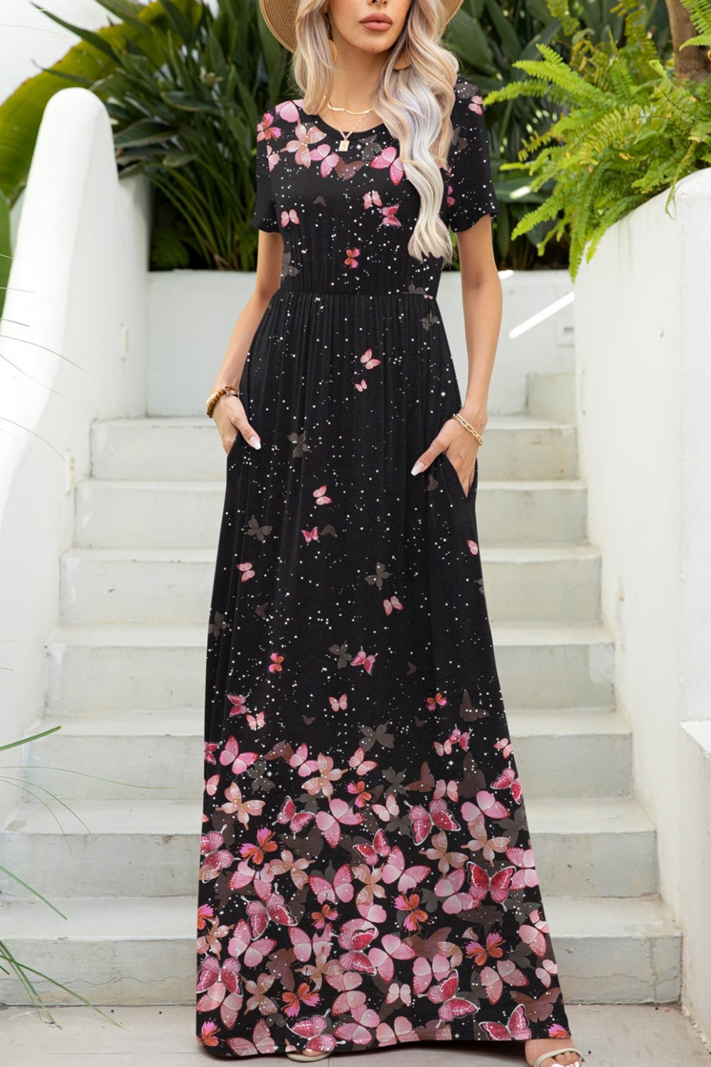 Black maxi dress with pink butterfly and floral print