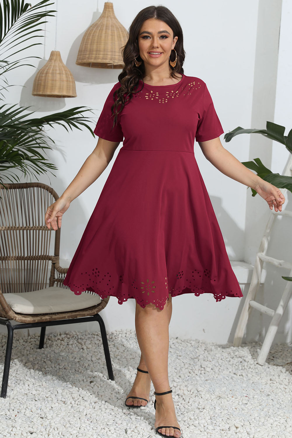 Discover elegance with our Plus Size Dress in red, black, mustard, and blue with a flattering fit and exquisite openwork detailing