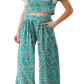 Chic teal printed top and pants set. Versatile, comfortable, and perfect for any occasion. Stand out with effortless style