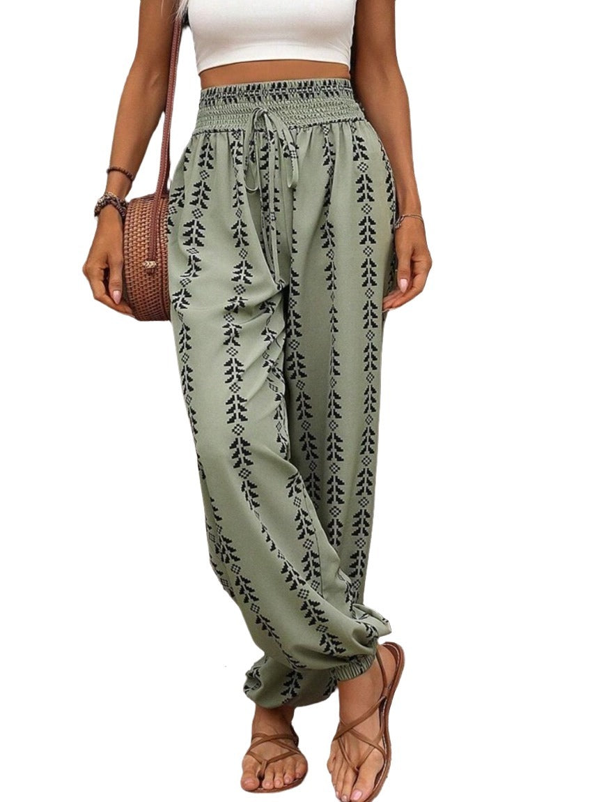 Green boho chic drawstring pants with intricate pattern