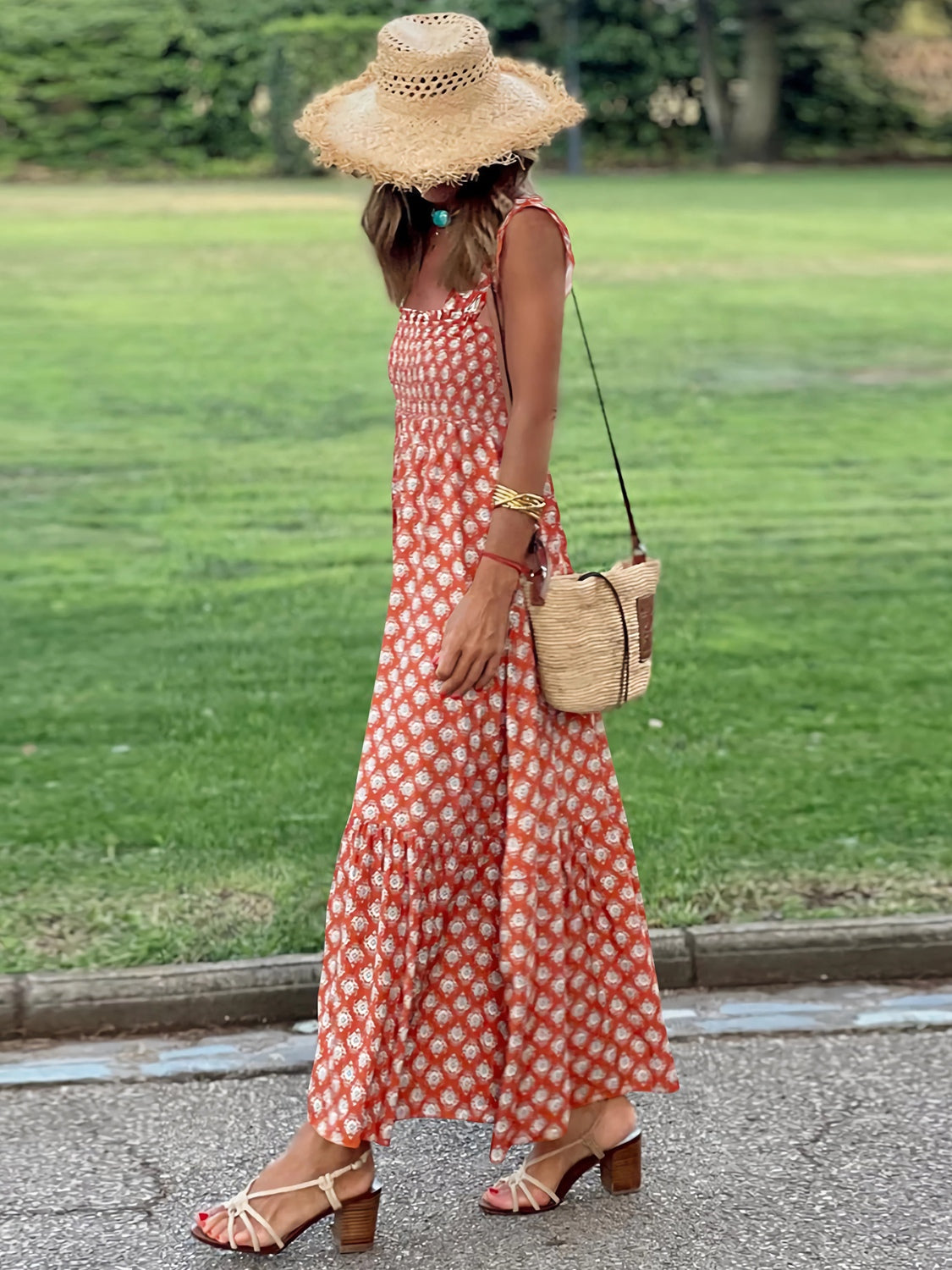 Elegant red maxi dress featuring lightweight fabric and whimsical boho design