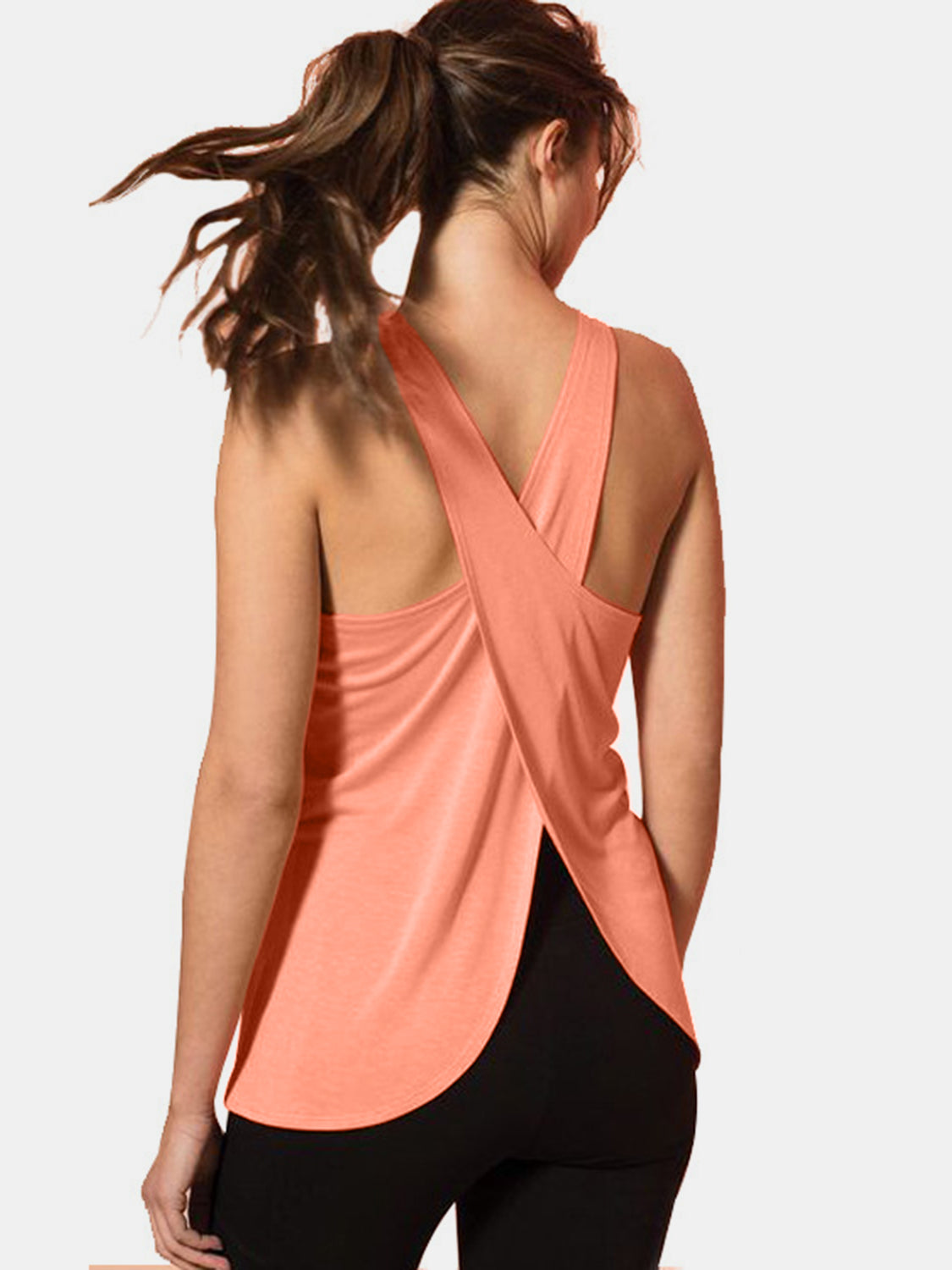 Coral Crisscross Scoop Neck Active Tank Top featuring a chic cross-back design.